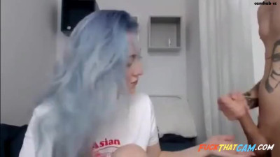 Blue haired cam girl sucks